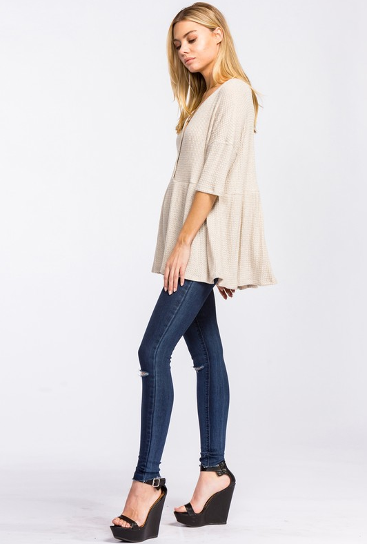 Thermal peplum top outlet